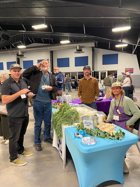 Three Sisters Oysters with Fritz eating.